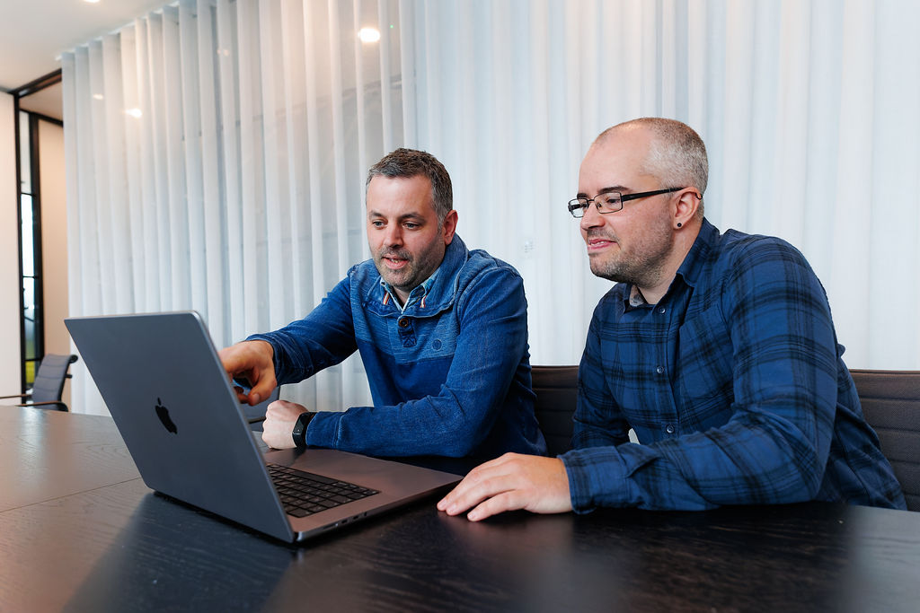 MakeCloud team reviewing code together